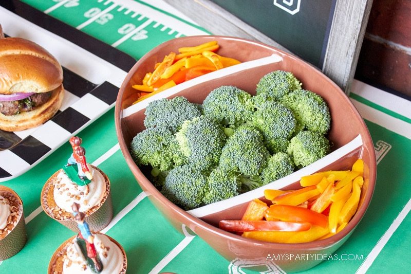 Football Shaped Ceramic Dishes | Tailgating 101 - Easy Gameday Entertaining Ideas from AmysPartyIdeas.com | Gameday Tailgate partyware from Swoozies.com |#football #tailgate #tailgatingideas #footballpartyideas #collegefootball #wareagle #mudpie